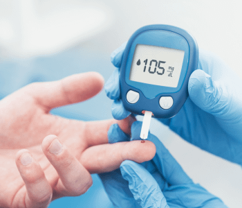 blood sugar test on a finger